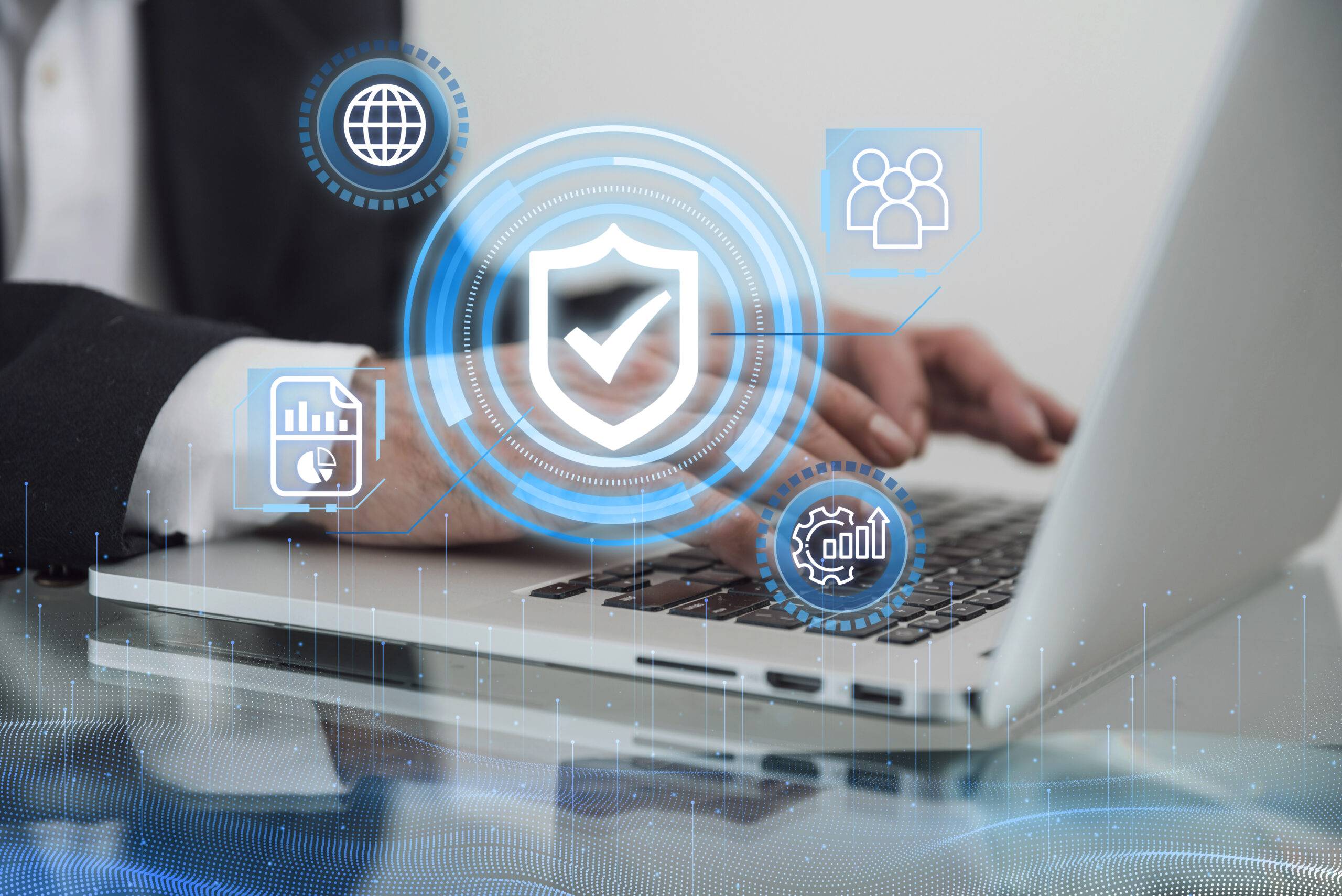 Small UK business owner reviewing GDPR compliance checklist on laptop in modern office
